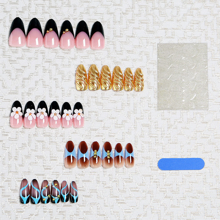 Artificial nail set with filigree floral decorations and glamorous accents Kalsten