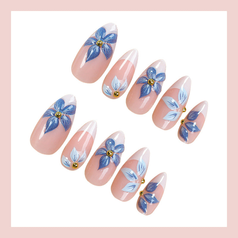 Nail art set with floral accents and elegant French tip Kalsten