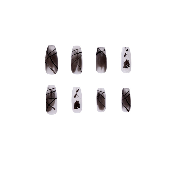 Artful stiletto nails with floral accents Kalsten