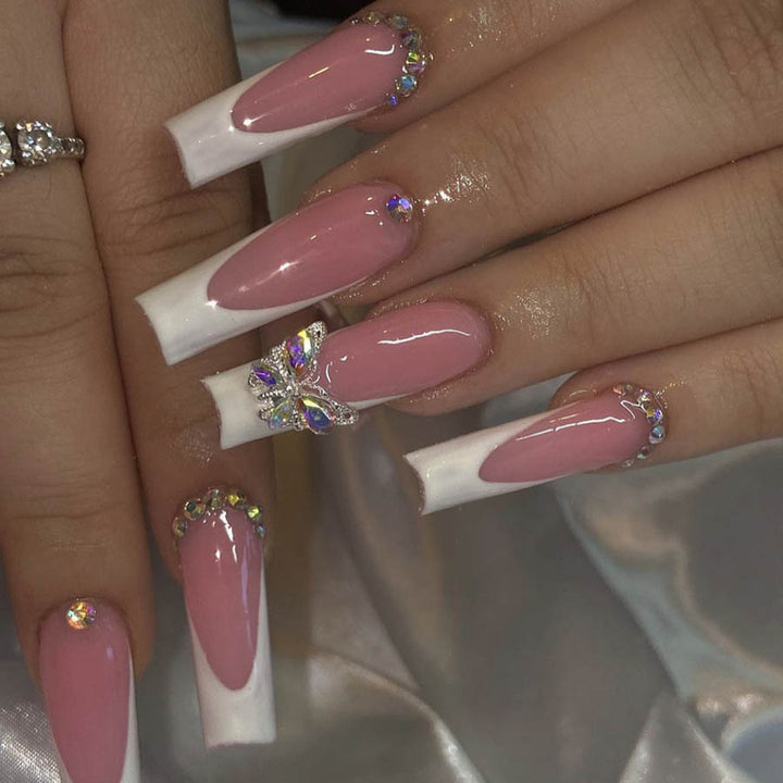Acrylic nail set with elegant design and sparkling rhinestone accents Kalsten