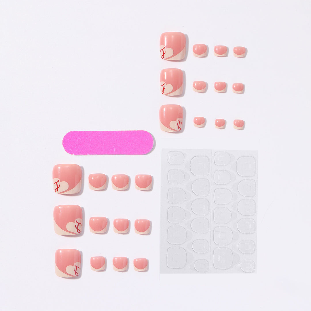 Artificial nail set with elegant French tips and romantic heart designs Kalsten