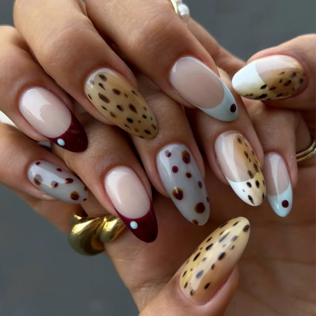 Artful stiletto nails with modern animal motif Kalsten