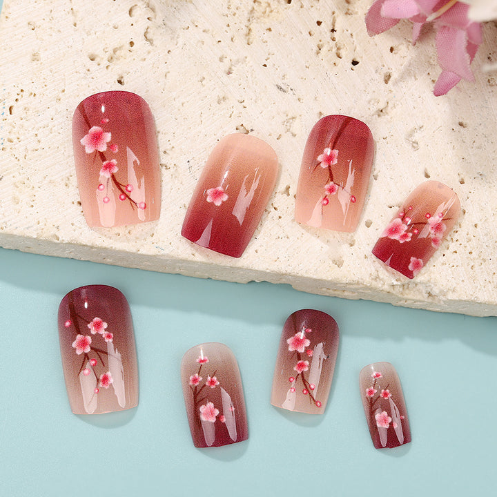 Artificial nails set with floral accents Kalsten