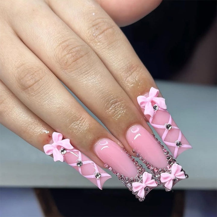 Artificial nail set with romantic bow and glitter accents Kalsten