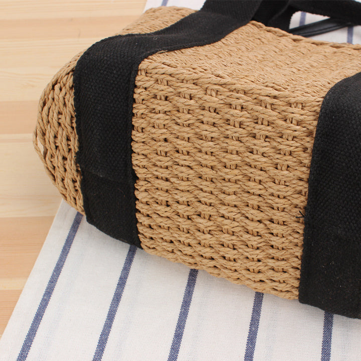 Handbag made of braided natural material with adjustable shoulder strap Kalsten