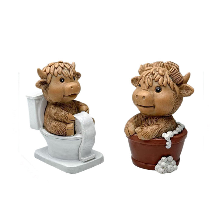 Funny decorative figure of a Highland cow on toilet Kalsten