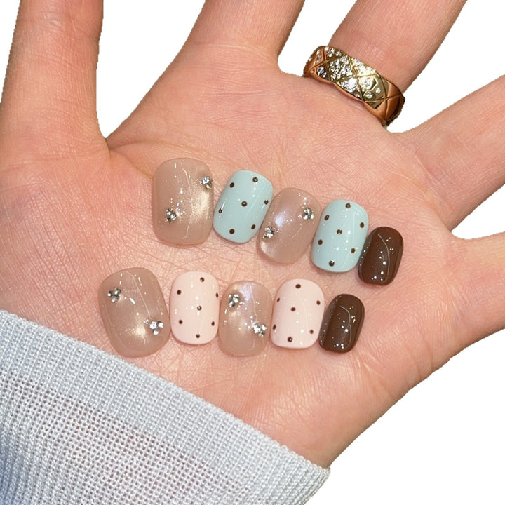 Acrylic nails with rhinestones and glitter Kalsten