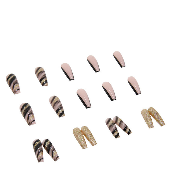 Acrylic nail set with luxurious golden accents and elegant designs Kalsten