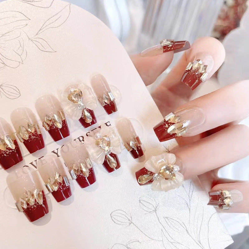 Artificial nails with glamorous floral decorations Kalsten