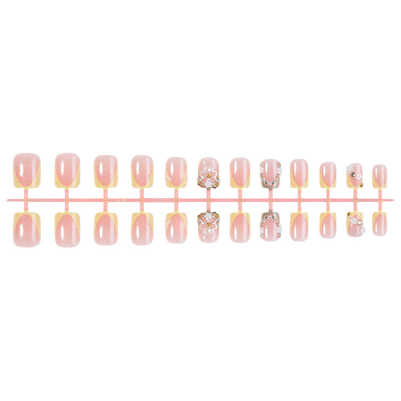 Nail art set with glamorous glitter and flower accents Kalsten