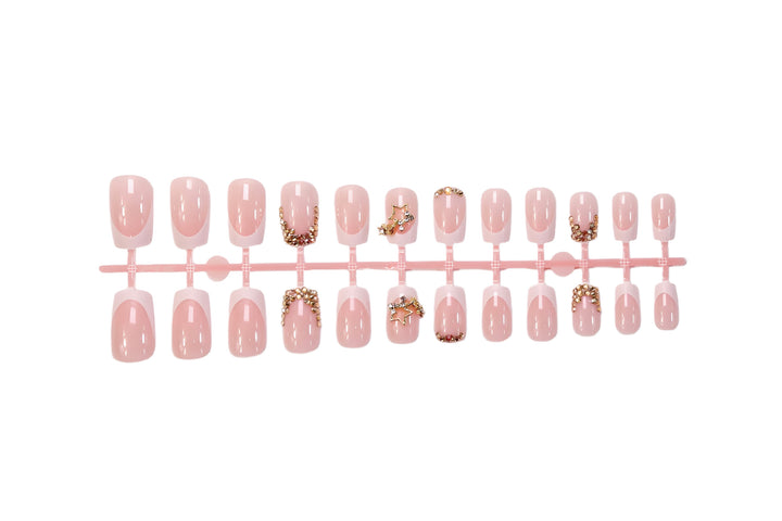 False nail set with glitter accents and holiday design Kalsten