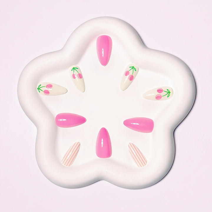 Artificial nails with fruity cherry design and striking colors Kalsten