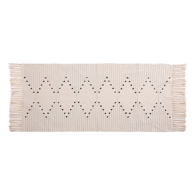 Woven runner rug with fringes and graphic polka dot pattern Kalsten