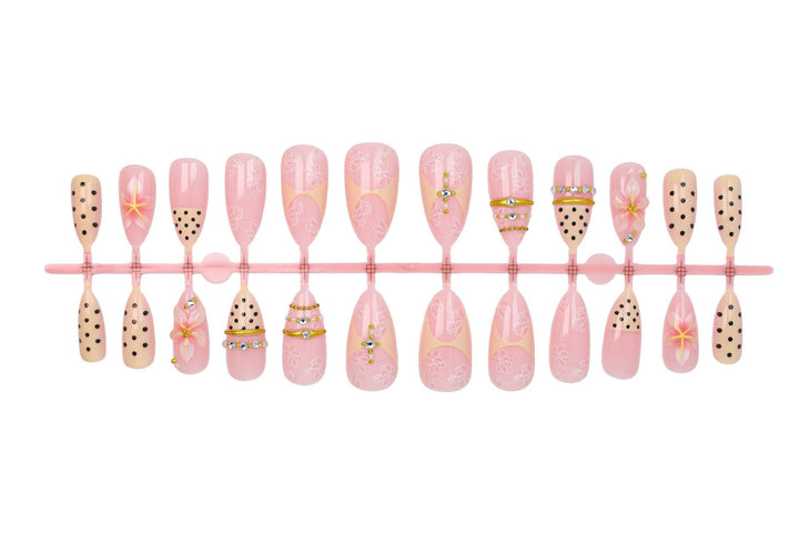 Artificial nail set with delicate floral patterns and elegant accents Kalsten
