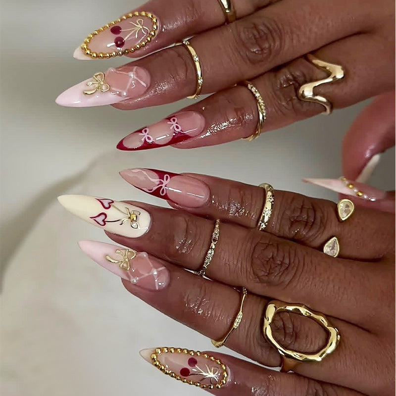 Creative nail art set with playful heart and bow accents Kalsten