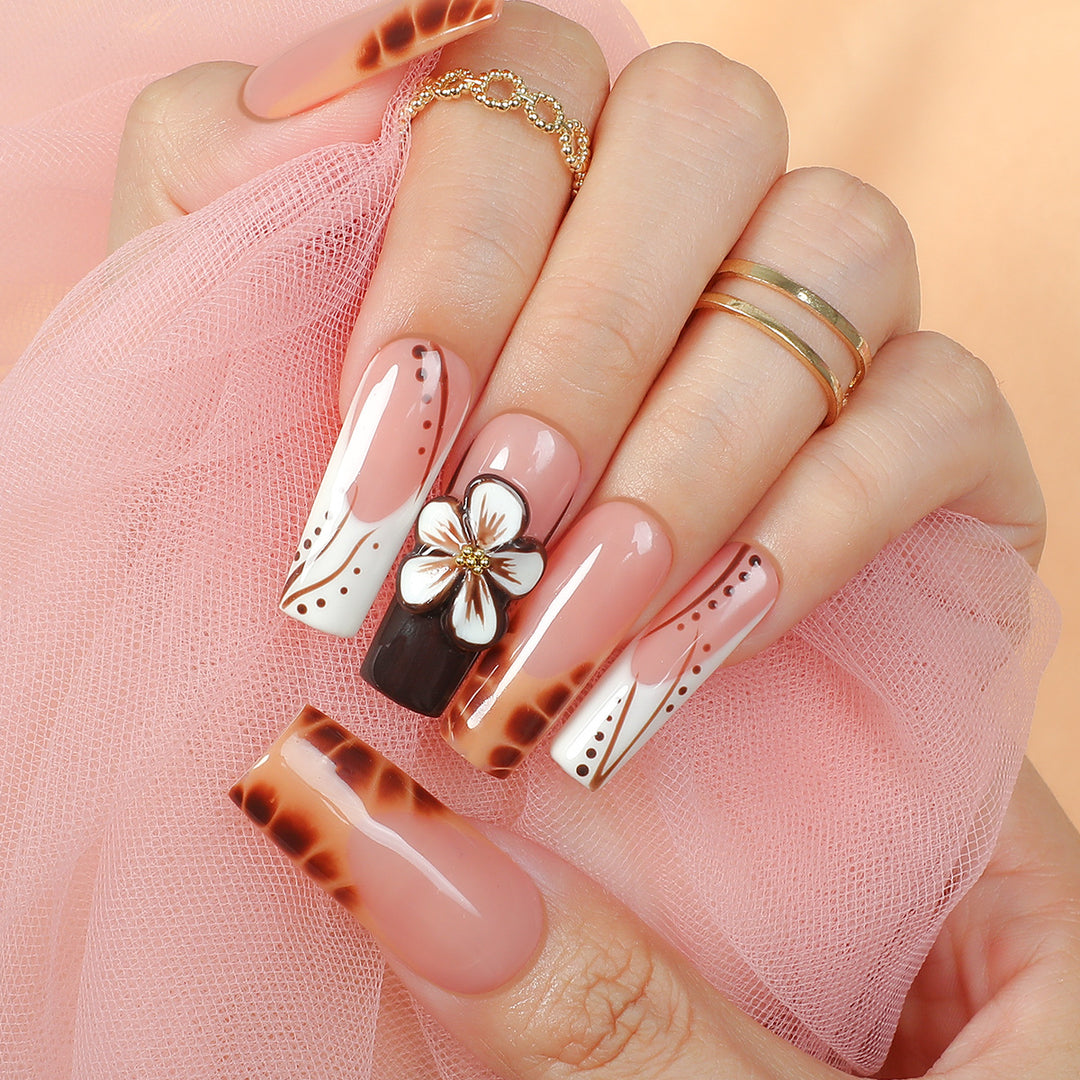 Creative nail art set with delicate floral and glitter accents Kalsten