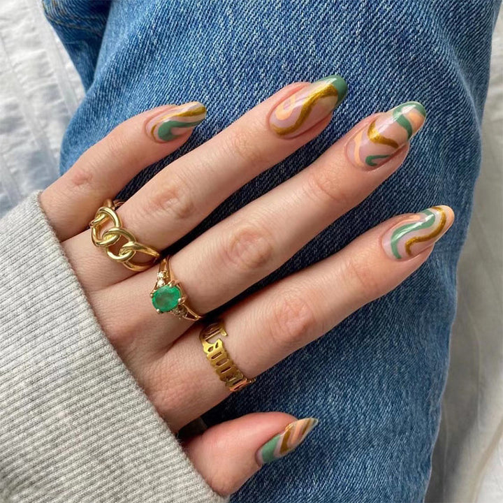 Artful nail extensions with an elegant leaf pattern Kalsten