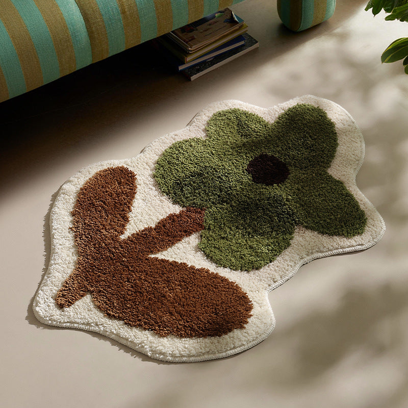 Flower-shaped hand-tufted bath mat with voluminous pile and non-slip latex backing Kalsten