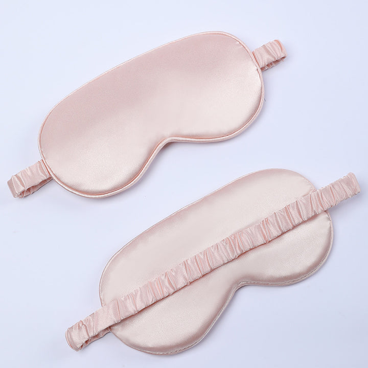 Women's nano silk sleep mask with padded eye area, adjustable elastic band, and storage pouch Kalsten