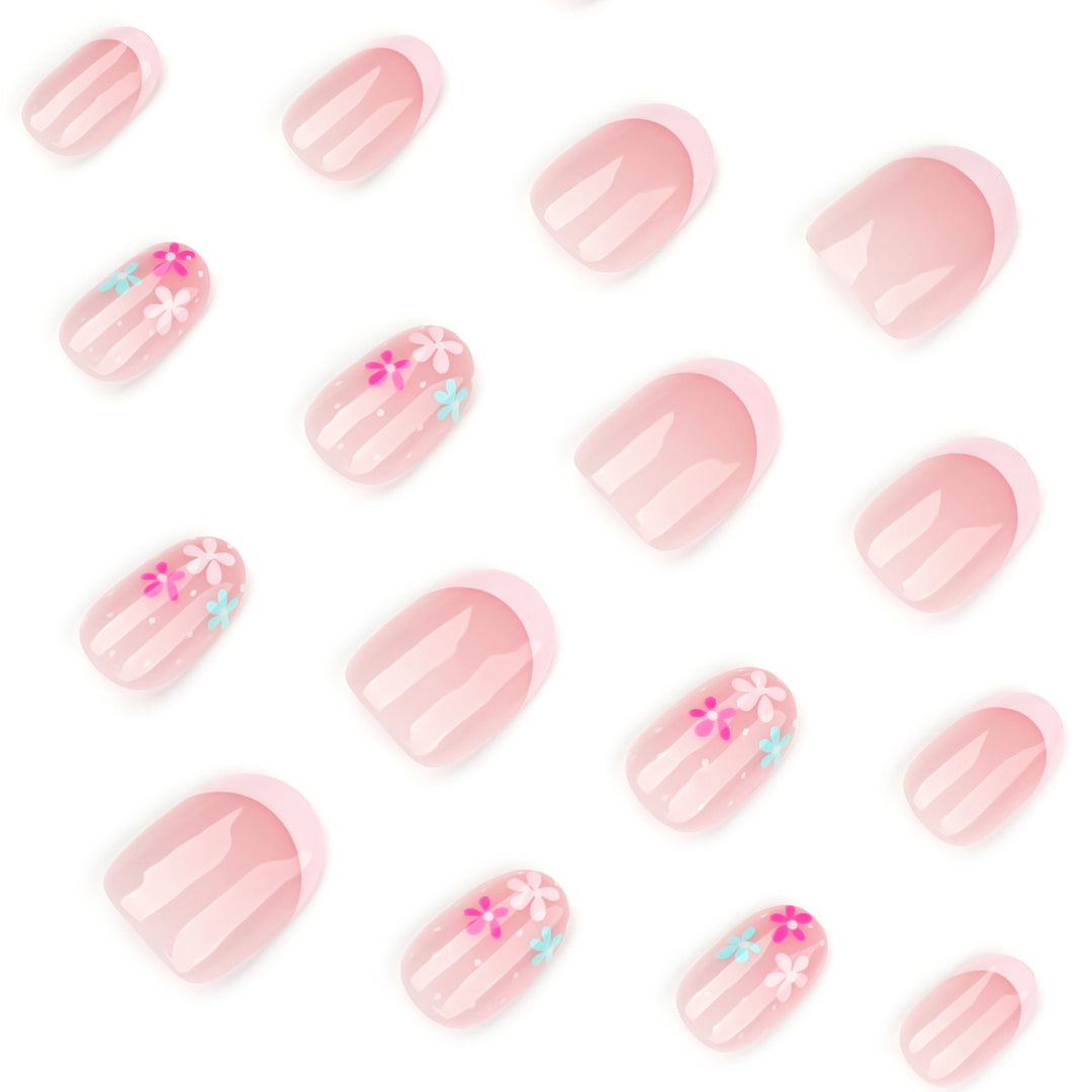 Artful nail extensions with colorful floral designs and glitter Kalsten