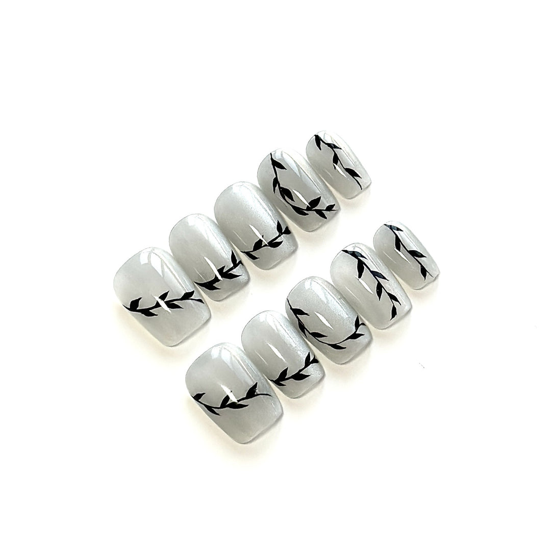 Artistic Press-On Nail Set with Botanical Designs