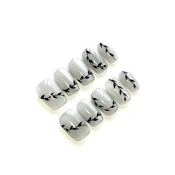 Artistic Press-On Nail Set with Botanical Designs