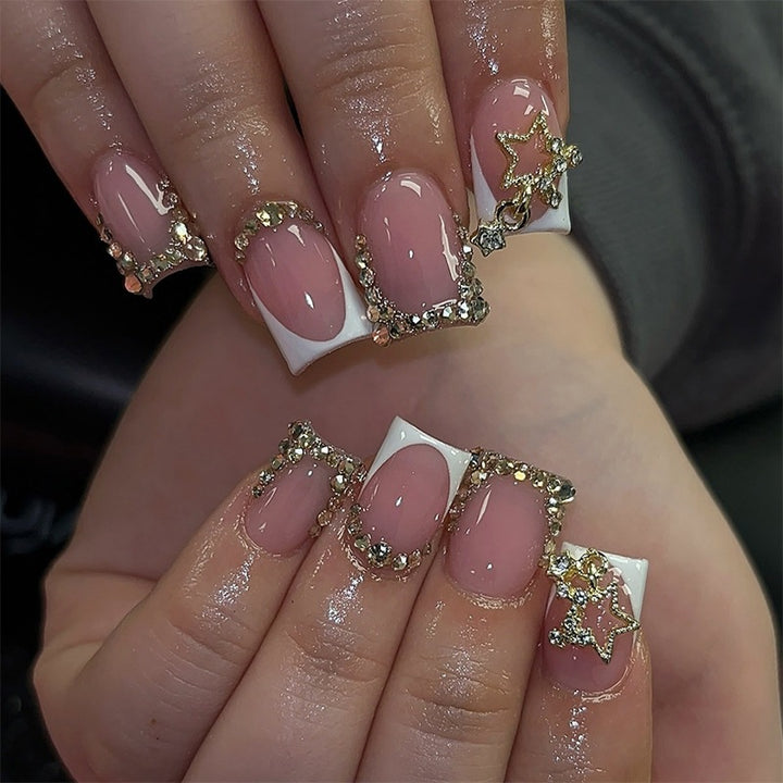 Artificial nail set with elegant flower design and glitter accents Kalsten