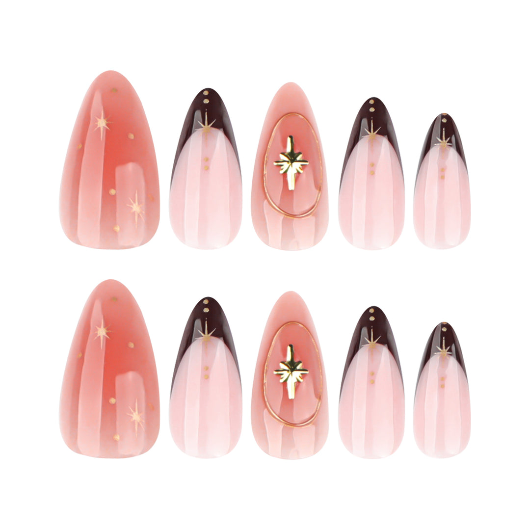 Artful stiletto nails with elegant gold embellishments Kalsten