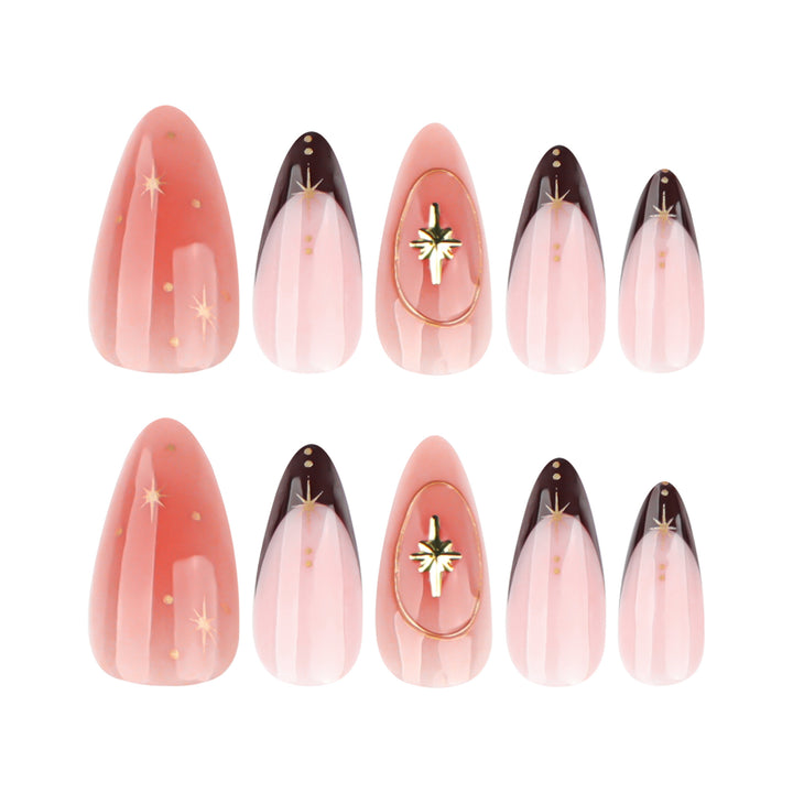 Artful stiletto nails with elegant gold embellishments Kalsten
