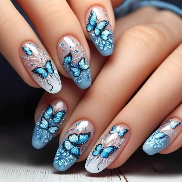 Art nail set with filigree butterfly and flower motifs Kalsten