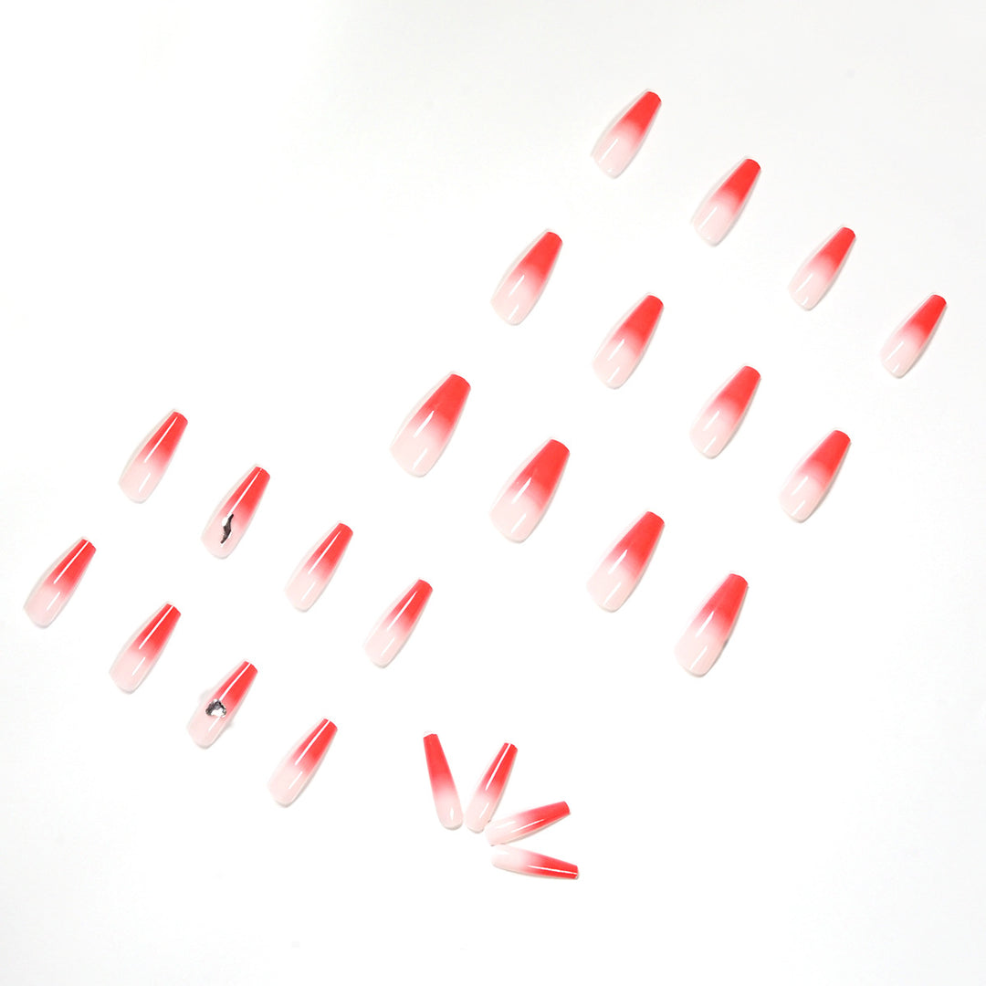 Artful stiletto nails with elegant gradient and rhinestone embellishment Kalsten