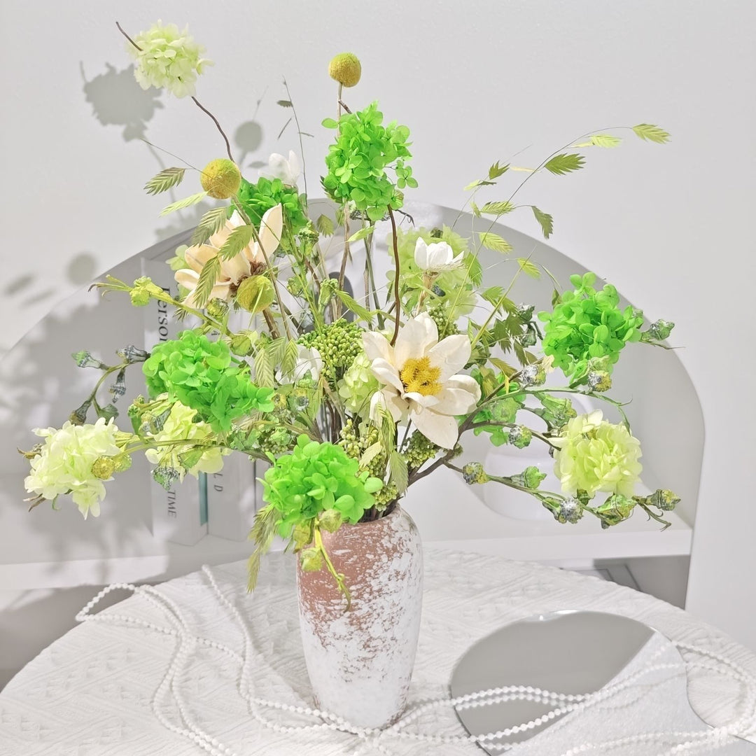 Lively Floral Arrangement in Decorative Ceramic Vase