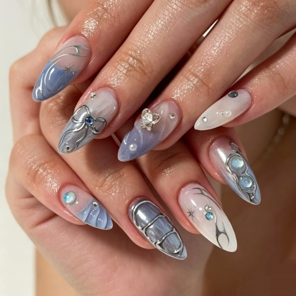 Artistic Press-On Nail Design with Floral and Gem Accents Kalsten