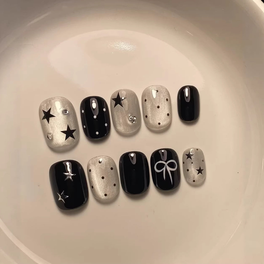 Artistic Press-On Nail Set with Star and Bow Accents