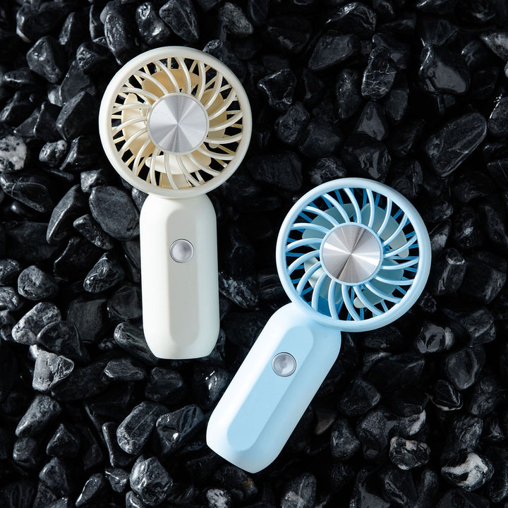 Women's portable mini fan with ergonomic grip technology Kalsten