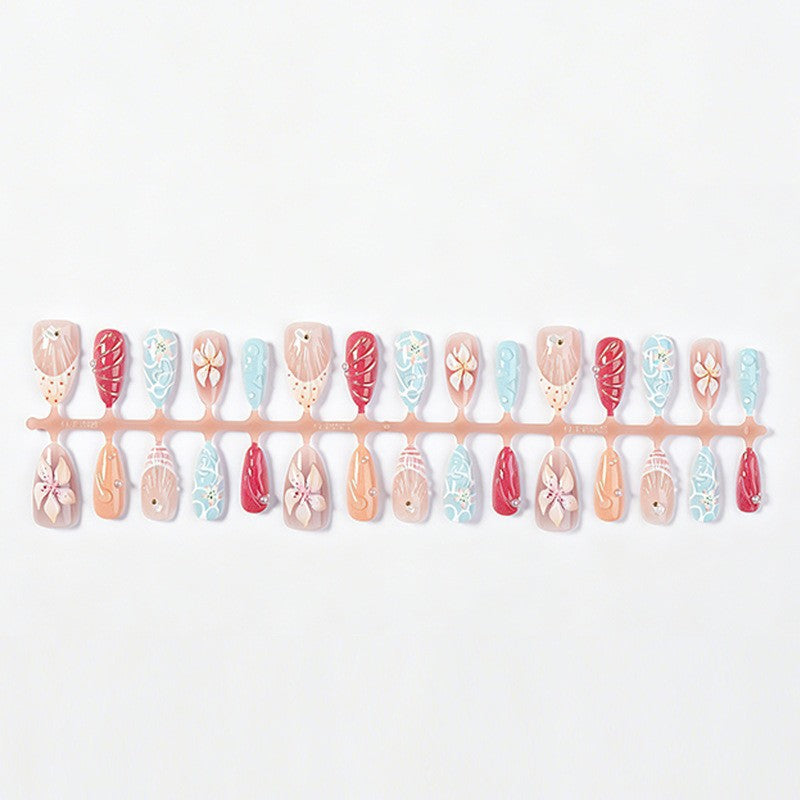 Artificial nail set with floral 3D design and glitter accents Kalsten