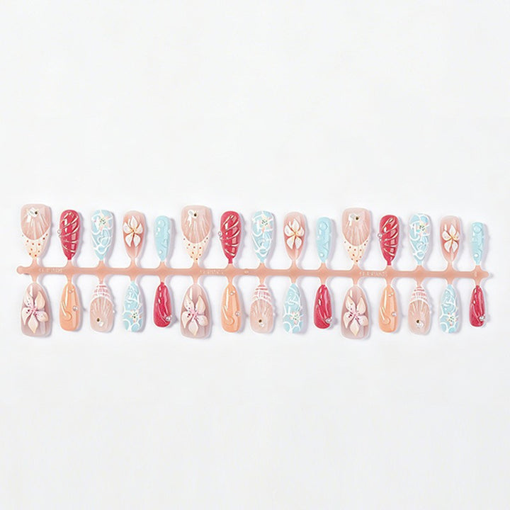 Artificial nail set with floral 3D design and glitter accents Kalsten