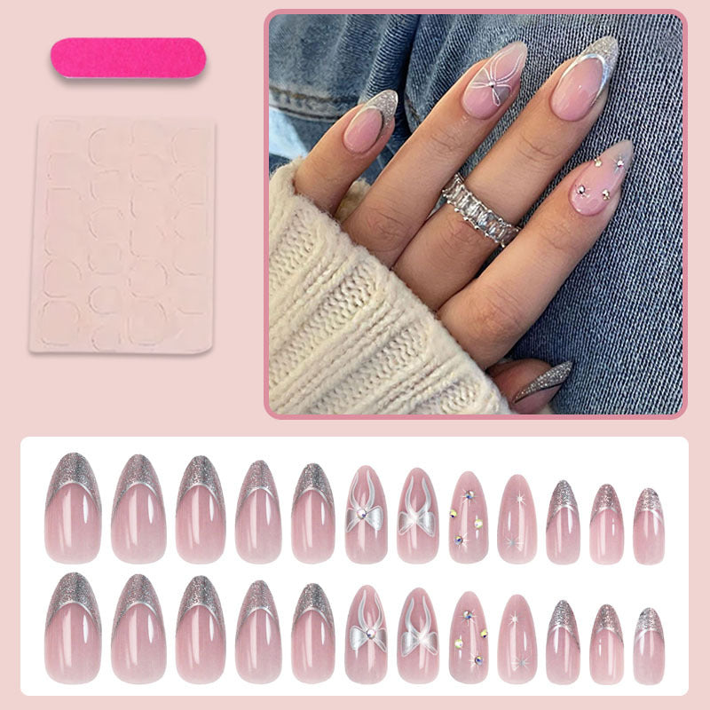 Artificial nail set with glamorous glitter and flower accents Kalsten