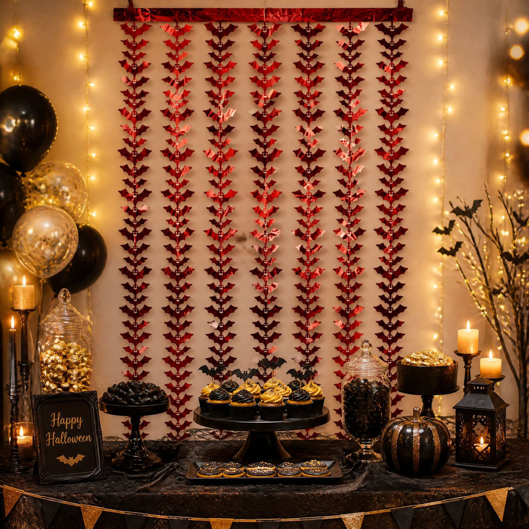 Hanging Halloween curtain made of metallic foil strips with bat silhouettes