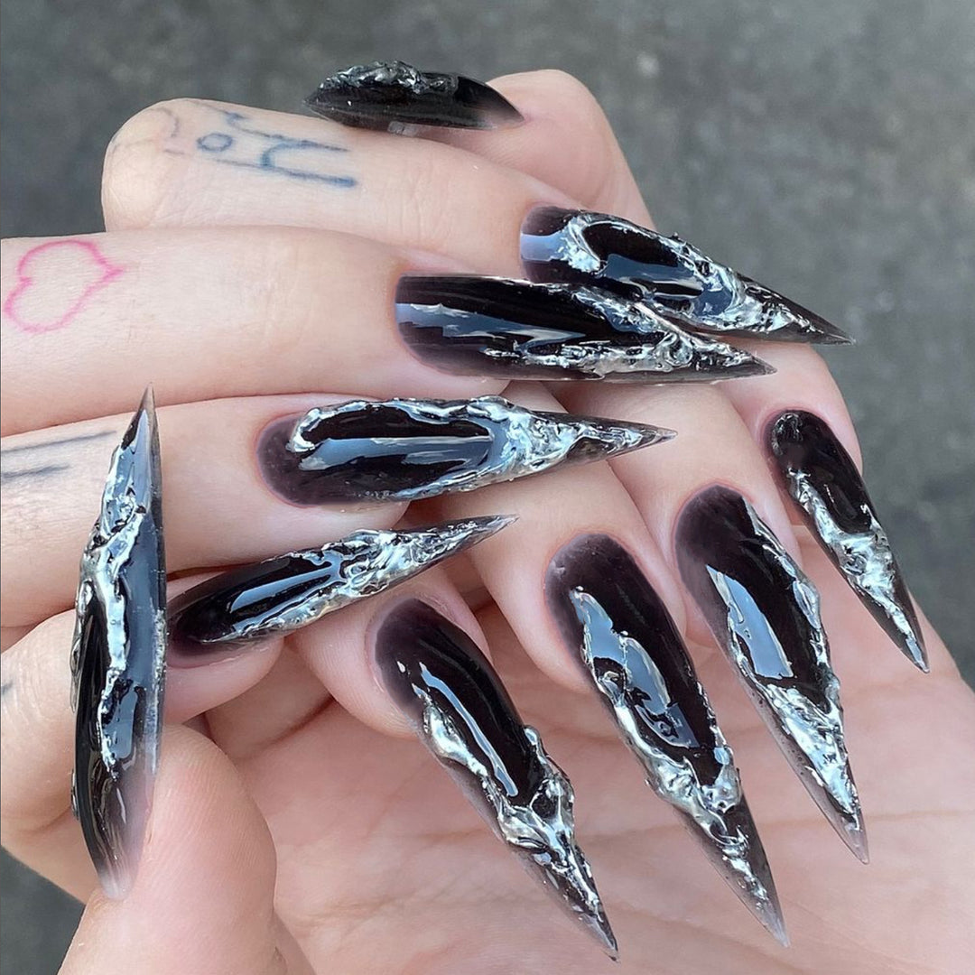 Artistic stiletto nails with modern metal effect Kalsten