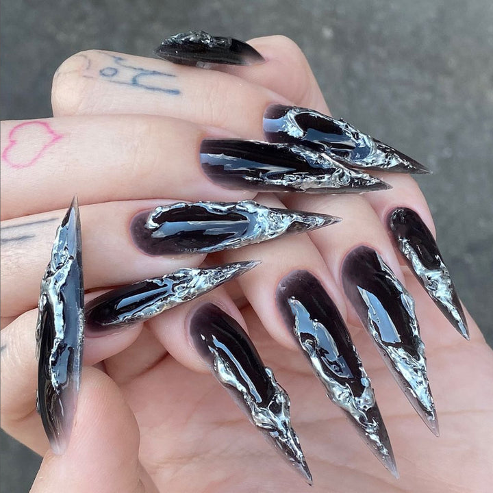 Artistic stiletto nails with modern metal effect Kalsten