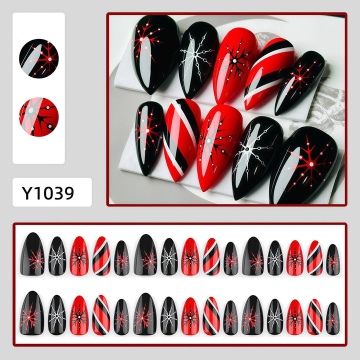 Artificial nails in modern stiletto design with graphic accents Kalsten