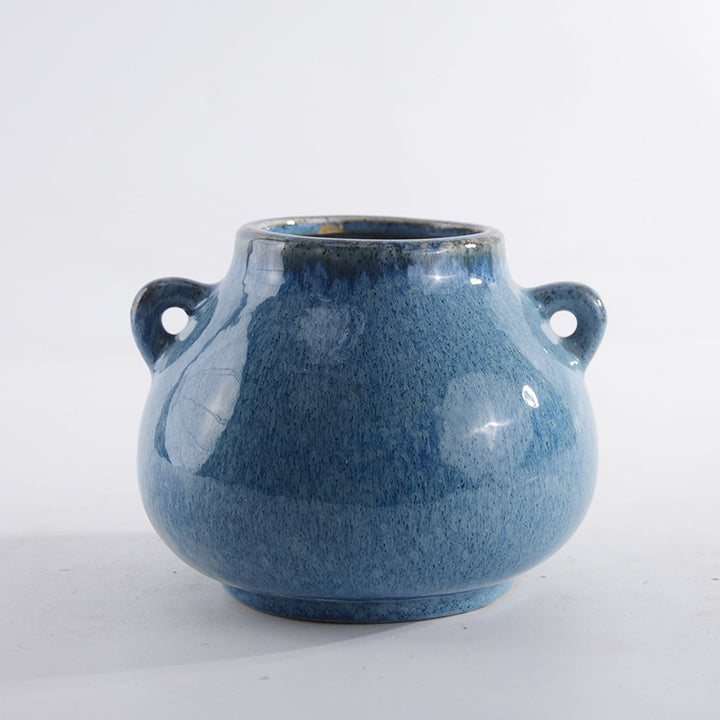 Decorative ceramic pot with playful handles Kalsten