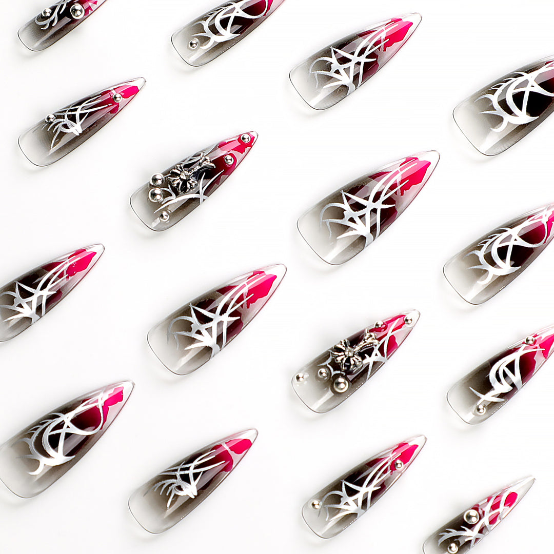 Artful stiletto nails with elegant decoration and modern accents Kalsten