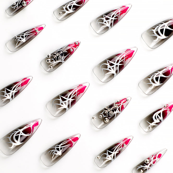 Artful stiletto nails with elegant decoration and modern accents Kalsten