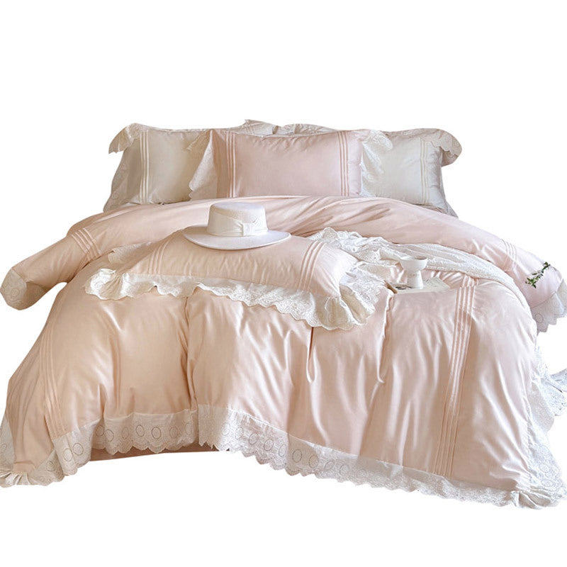 Fine cotton satin bed set with lace, ruffles and decorative stitching