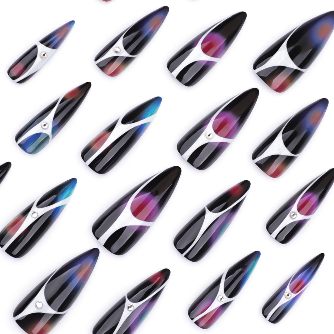 Artful stiletto nails with sparkling accents and geometric design Kalsten