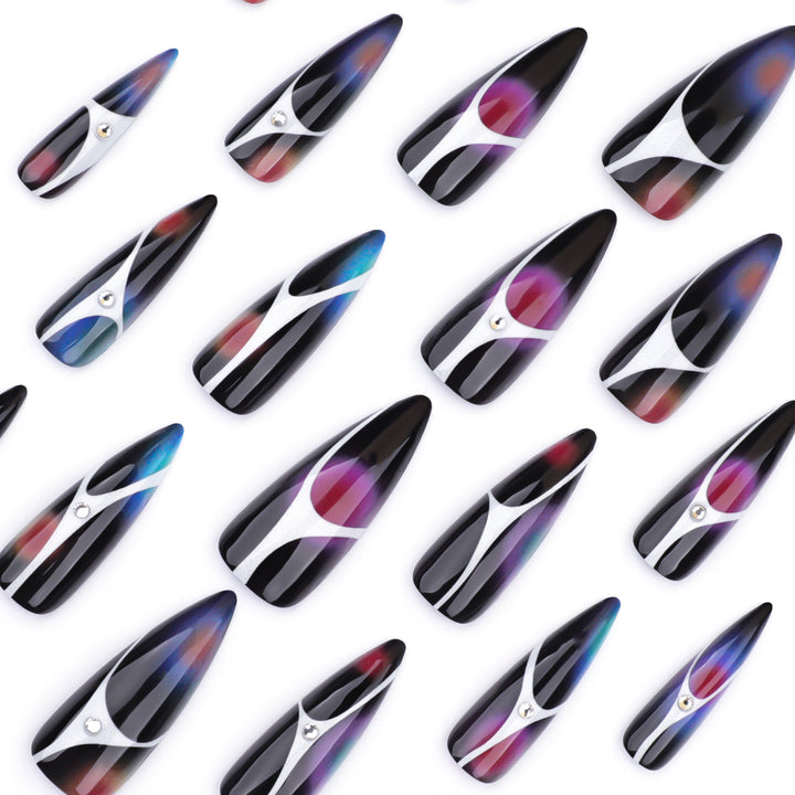Artful stiletto nails with sparkling accents and geometric design Kalsten