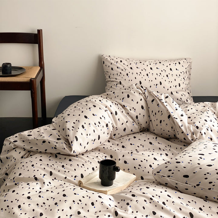 Reversible Mako cotton satin duvet cover set with minimalist dotted terrazzo look