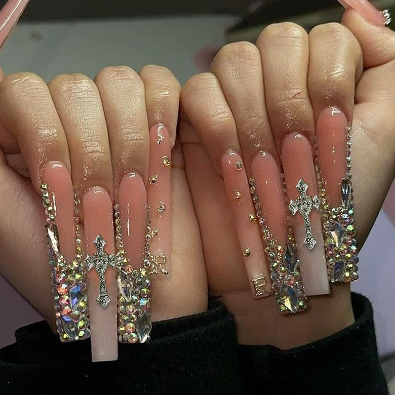 Glamorous artificial nail set with sparkling rhinestones and cross decorations Kalsten